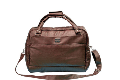 Denri Africa's brown Voyage Travel Bag. Extra-large travel bag, rugged vegan leather carryall, great for extended trips.